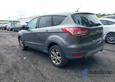 2013 Ford Escape Sel z USA, uszkodzony, nr VIN 1FMCU9H96DUC87413